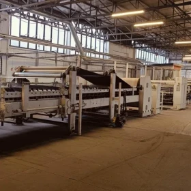 Technological line for the production of corrugated cardboard, model WJ150-1600-3, and a cardboard drying line