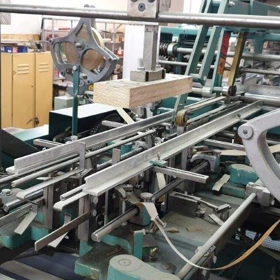 Použitá potahovací linka na tuhé krabice Crathern & Smith HNS 1998 + Perondi IA-5060 + Quad Stayer RS-2 – Polsko