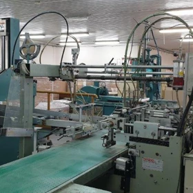 Použitá potahovací linka na tuhé krabice Crathern & Smith HNS 1998 + Perondi IA-5060 + Quad Stayer RS-2 – Polsko